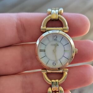 Two Fossil Watches with Ornate Bracelet Design